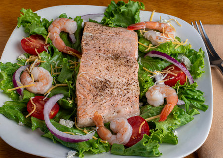 baked season salmon served on a salad,の写真素材
