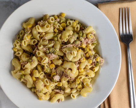 tuna macaroni salad  with  peas and cornの写真素材