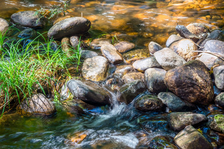 water cascading over rocks in willard brook  located in willard brook state forest