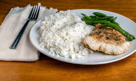baked cod with   sauteed green beans and  rice