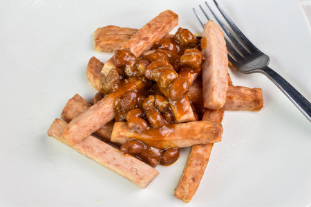 chili seved on top of  spam fries