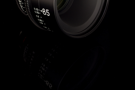 Professional Cinema Lens - camera lenses on the mirroring black background.の写真素材