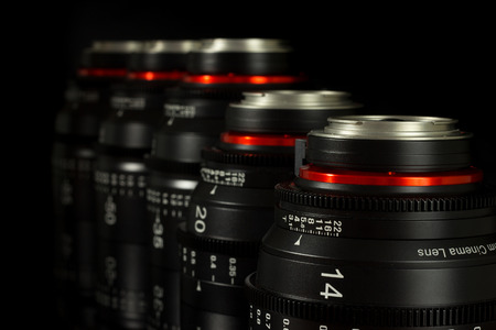 Professional Cinema Lens - camera lenses on the mirroring black background.の写真素材