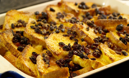 Delicious traditional Bread and Butter pudding with egg custard sugar and dried fruits.  Shallow dof.の写真素材