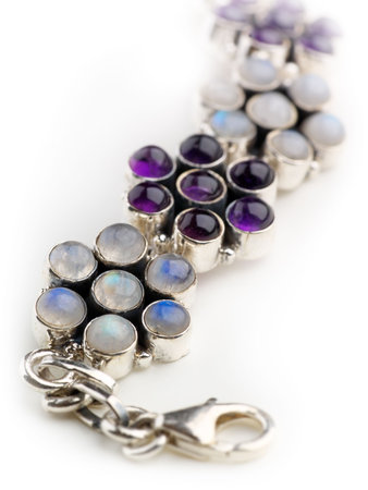 Unbranded rough costume jewellry in silver with rainbow moonstone and amethystsの写真素材