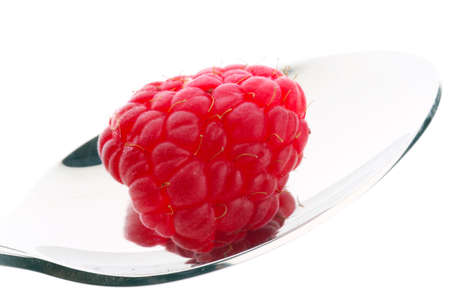 Raspberry on a spoonの写真素材