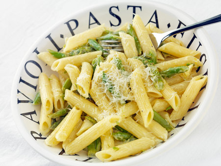 Fusilli pasta with Asparagus and grated Parmesanの写真素材