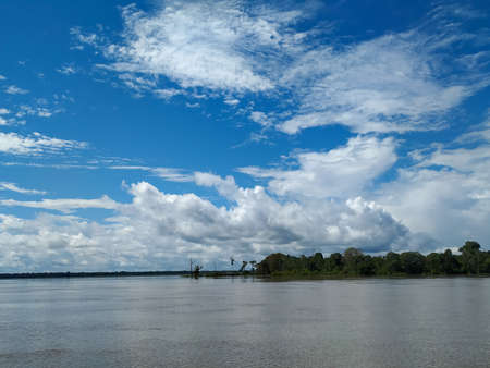 Amazon River and clouds reflexの写真素材