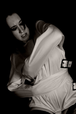 Woman in straightjacket