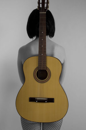 Woman with guitar.