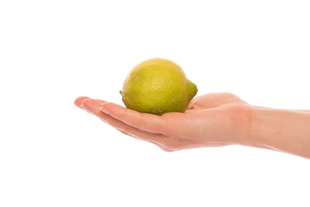 Hand with lemon isolated on white backgroundの写真素材