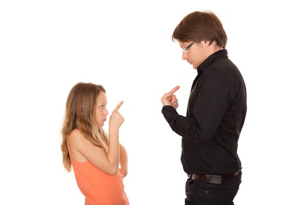 Young girl attack her father by pointing her fingerの写真素材