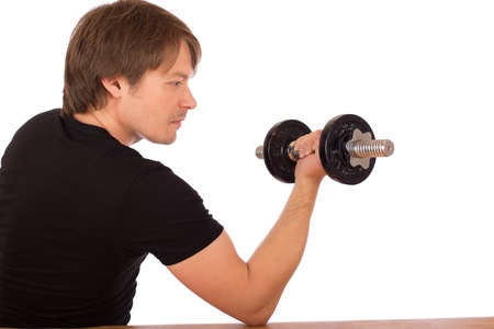 Man make exercise with dumbbell. Isolated on white background.の写真素材