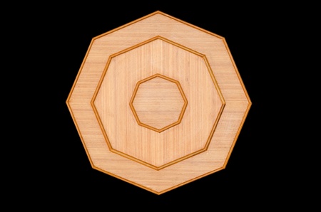 Eight-square wooden,isolated on black backgroundの写真素材