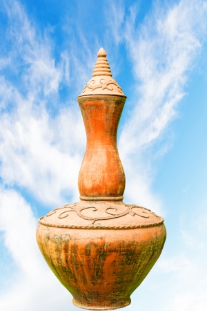 Old jug with sky backgroundの写真素材