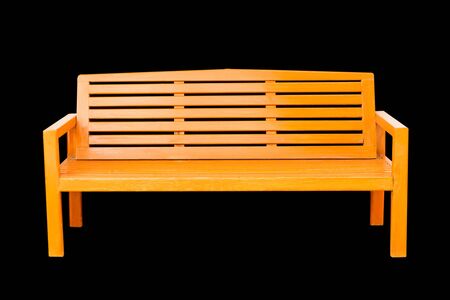 wooden bench, isolated against a black background の写真素材
