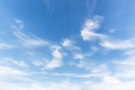 blue sky background with tiny cloudsの写真素材