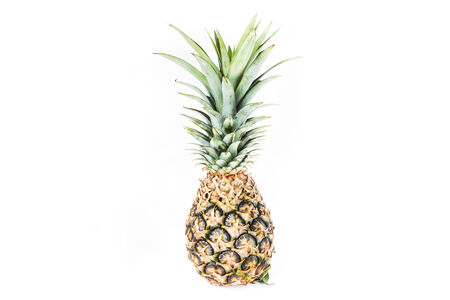 Ripe pineapple isolated on white backgroundの写真素材