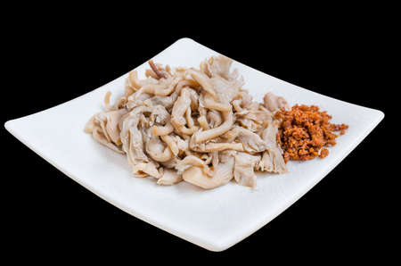 steamed mushrooms isolated on white diskの写真素材