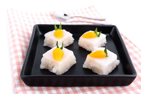 Thai dessert made from glutinous rice and sprinkle with coconut milk and golden Thai dessertの写真素材