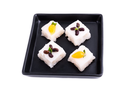 Thai dessert made from glutinous rice and sprinkle with coconut milk and black beans and golden Thai dessertの写真素材