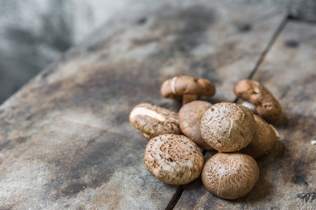 Shiitake mushroom on wood tableの写真素材