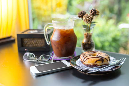 Fresh Homemade Donuts and Coffee against a backgroundの写真素材
