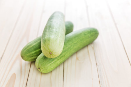 fresh cucumbers on woodenの写真素材