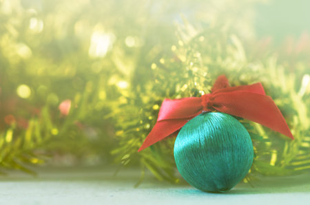 Christmas ball with ribbon on a background -vintage