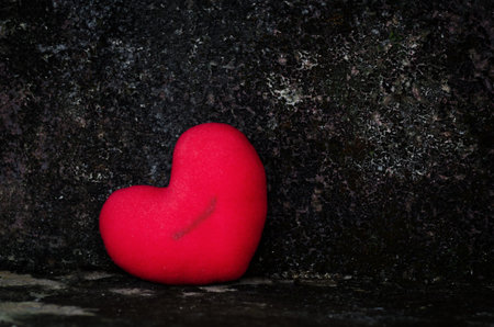 Stitched heart, broken heart cheating, sad concept,vintage filter effects-grunge styleの写真素材