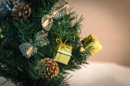 gifts under the tree for christmas day, christmas tree and presentsの写真素材
