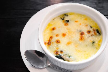 Baked spinach combine with cream, Baked spinach with cheeseの写真素材