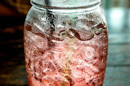 Strawberry flavor aerated drinks whit soda and ice in glass, Sweet water in a glassの写真素材