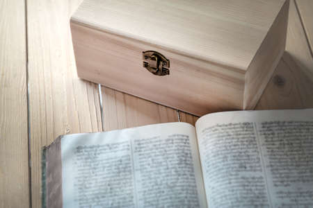 Still-life with wooden box, vintage closed wooden box with lockの写真素材