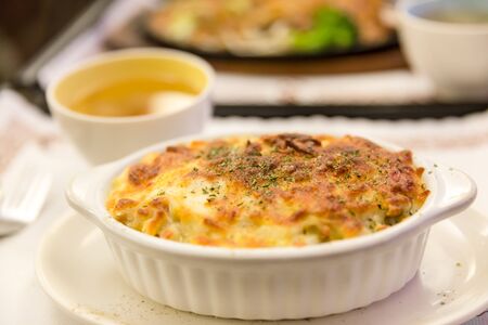 spaghetti with baked cheese, Gratin Spaghetti with Mushroomの写真素材