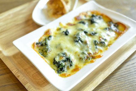 spinach cheese with garlic breadの写真素材