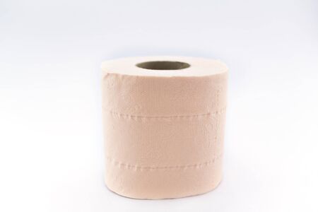 Simple toilet paper on white background - selective focusの写真素材