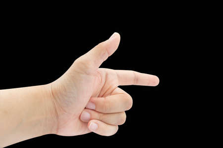 Finger point isolated on black backgroundの写真素材