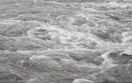 splashing waves shot from directly above - black and whiteの写真素材