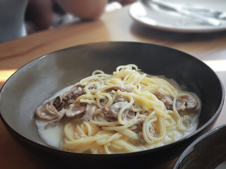 vegetarian pasta (spaghetti) cream sauce with mushroomsの写真素材