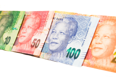 Close-up of multiple South-Africa Rand banknotes on whiteの写真素材