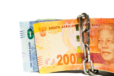 Safety for your money concept with South-African rand banknotes isolated on whiteの写真素材