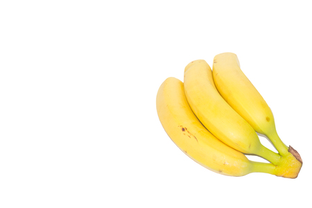 Bunch of fresh bananas isolated on a white background with copy-space on the rightの写真素材