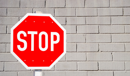 Stop banging your head against a brick wallの写真素材