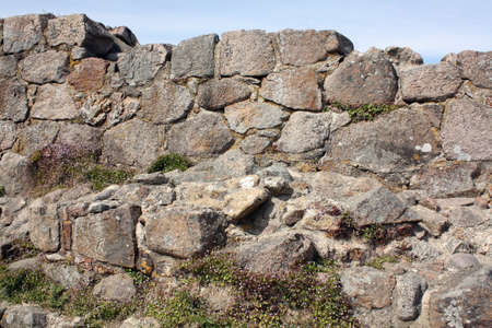 Old wall from the Hammershus ruins on the Danish island Bornholmの写真素材