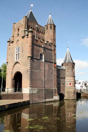 Old citys gate \\\\\\\"The Amsterdamse Poort\\\\\\\" in Haarlem. Netherlandsの写真素材