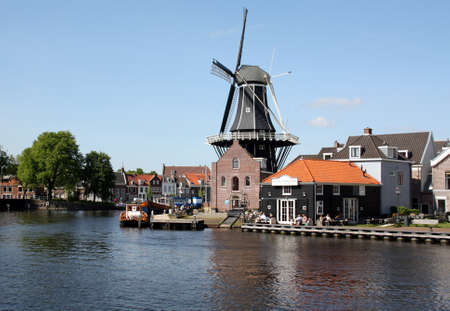 Windmill \"De Adriaan\" from 1779 on the river De Spaarnein Haarlemのeditorial素材