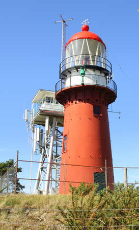 Red lighthouse on the island of Vlieland. the Netherlandsの写真素材