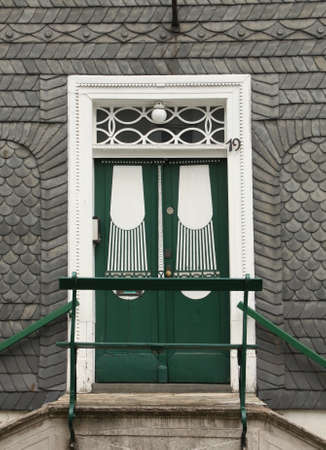 Bad-Berleburg. May-17-2015. Original door in slate house on Bad-Berleburg. Germanyのeditorial素材