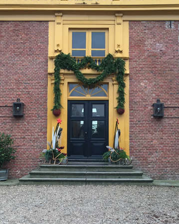 Slochteren. December-29-2019. The entrance to Castle Fraeylemaborg in Slochteren from the 13th century in a christmas atmosphere. the Netherlandsのeditorial素材